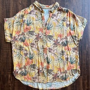 Hawaiian style button-up t-shirt.